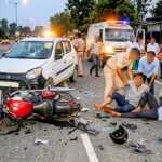 बेलगाम रफ्तार और नशे का कहर: नगला बाईपास पर रॉन्ग साइड से आई कार ने बुलेट के उड़ाए परखच्चे, दो गंभीर घायल